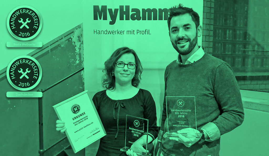 Webdesignerin Katarzyna Tichnowetzki und Dachdeckermeister Adam Pilch aus Berlin bei der Preisverleihung.